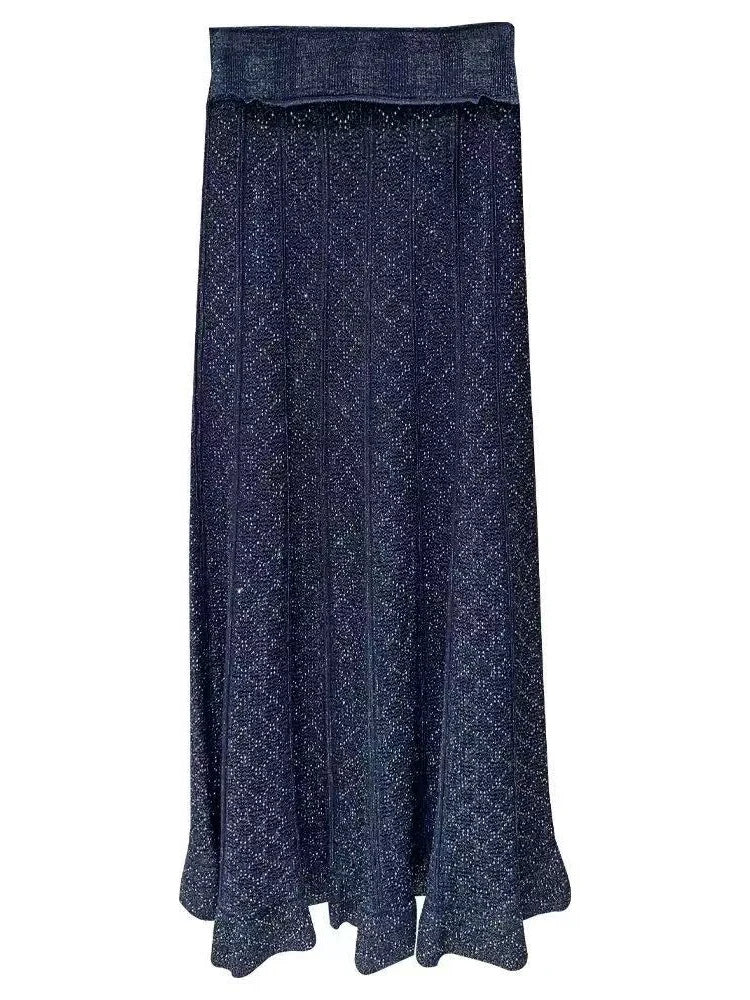 Flat view of Jessa navy blue maxi skirt with ribbed waistband and geometric knit pattern
