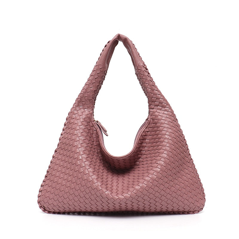 حقيبة جلدية نباتية مصنوعة يدوياً