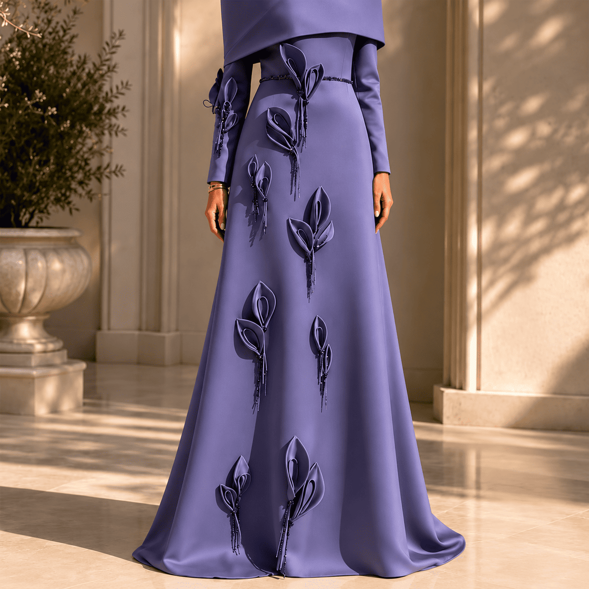 Close-up of the beaded waist trim and beaded tassels on the dusty purple Vibia dress
